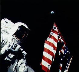[Flag, Earth and Astronaut Schmitt]